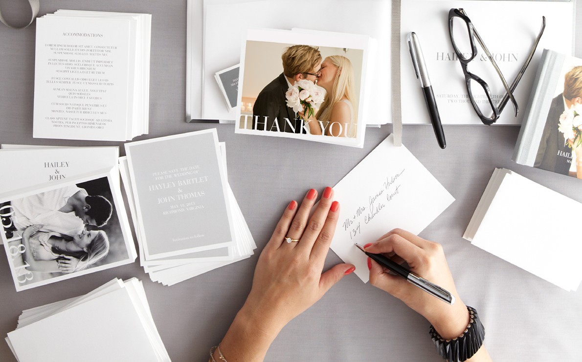 Writing Thank You Note on Photo Card