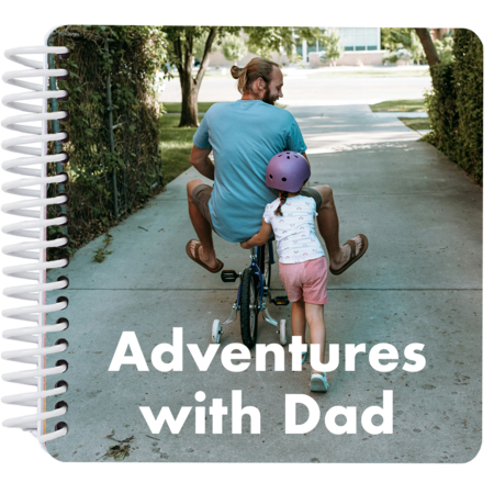 Personalized "Adventures with Dad" board book cover featuring a child and dad riding a bike together