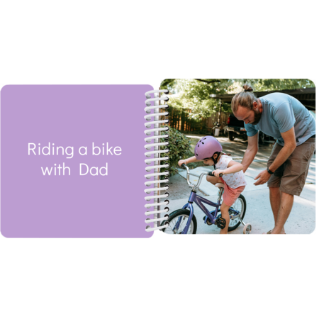 Dad helping child ride a bike in a personalized Adventures with Dad board book with the message "Riding a bike with dad"