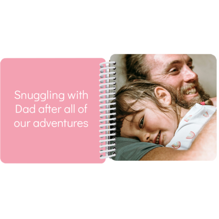 Daughter resting her head on dad's shoulder in a personalized Adventures with Dad board book with the message "Snuggling with dad"