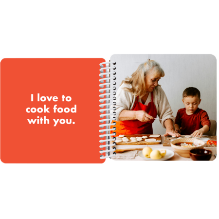 Grandmother and grandson cooking together in a personalized Grandma and Me board book with the message "I love to cook with you"