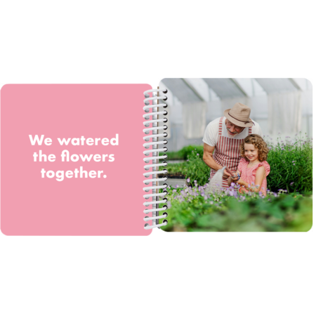 Grandfather and granddaughter watering flowers together in a personalized Grandpa and Me board book with the message "We watered the flowers together"